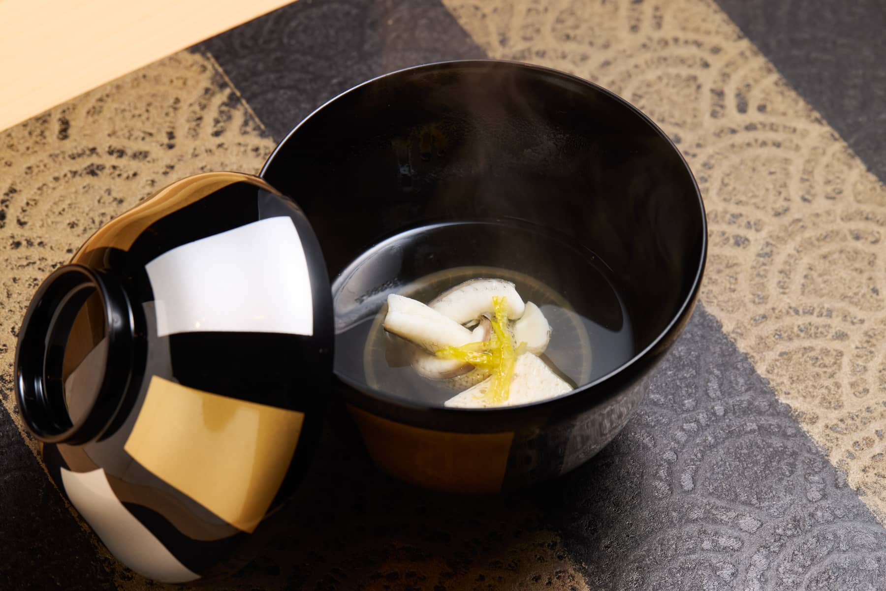 Cod milt and steamed fish cake in a turnip broth